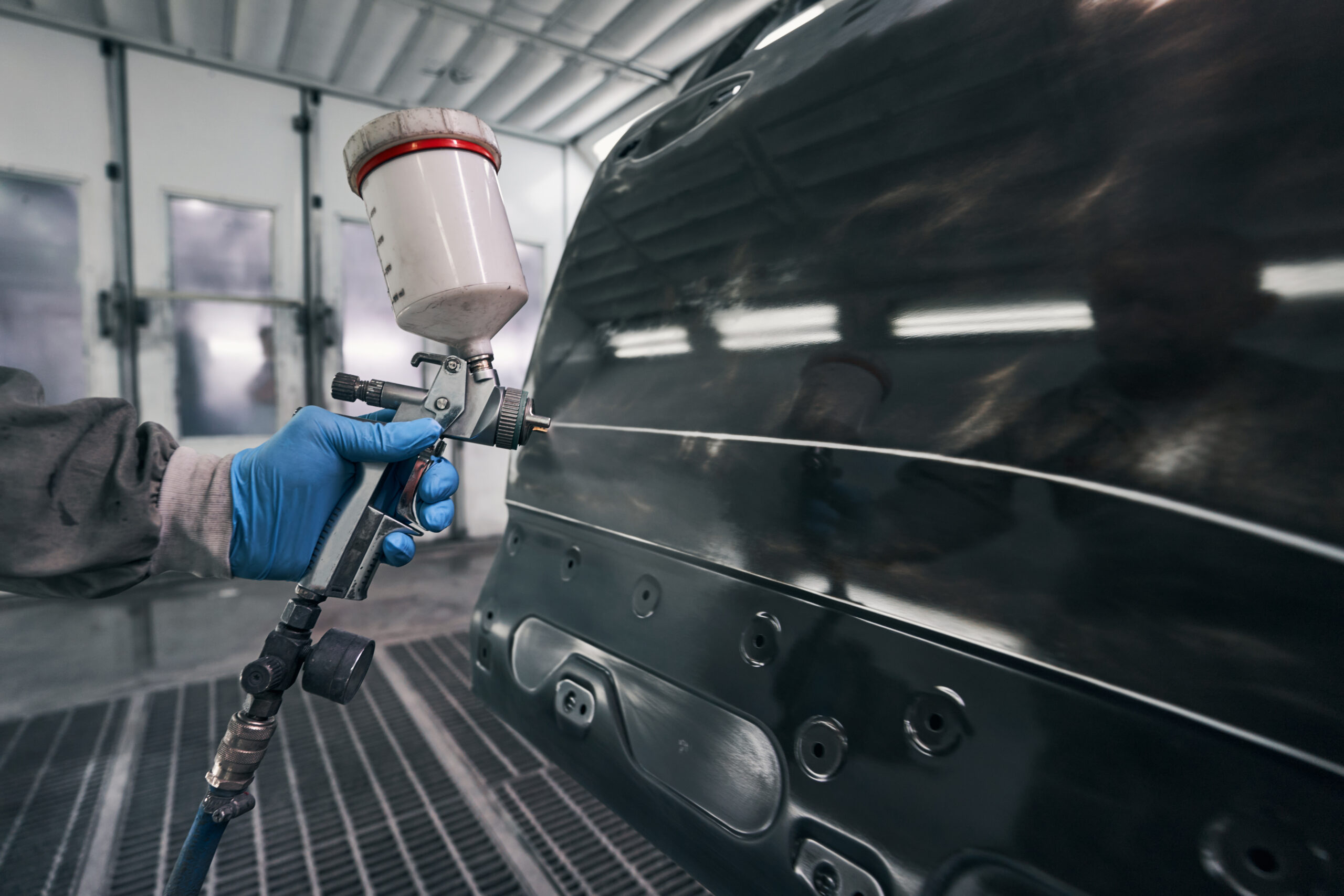 male activating paint spraying pistol while workin 2026 01 08 22 15 32 utc