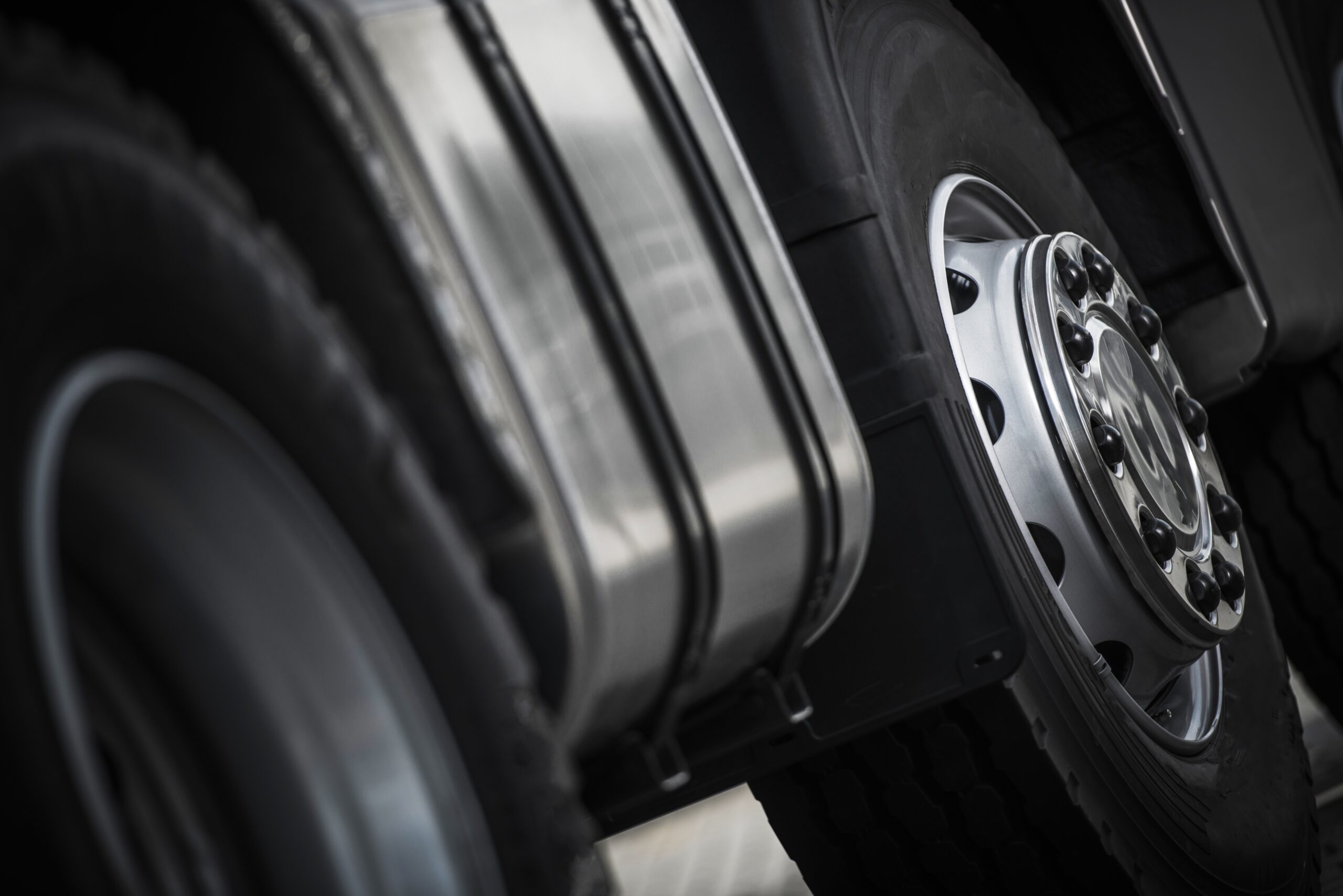 macro shot of truck tires and fuel tank 2026 03 25 00 24 06 utc